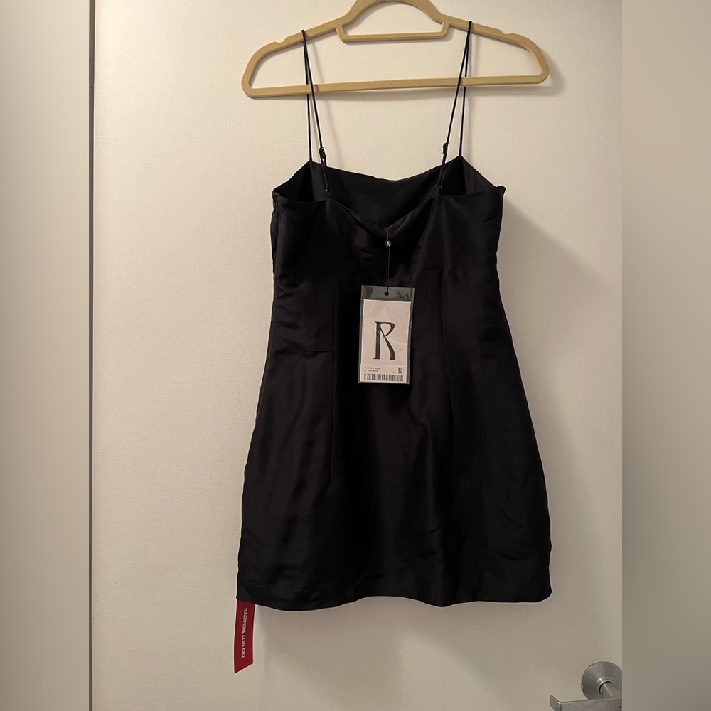 Realisation par black dress with adjustable straps. The christy size Medium